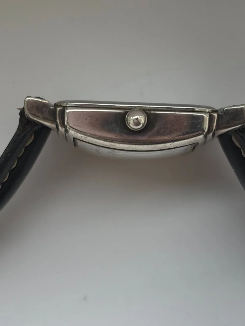 Vintage Fossil watch in Art Deco style with silver bezel and square face
